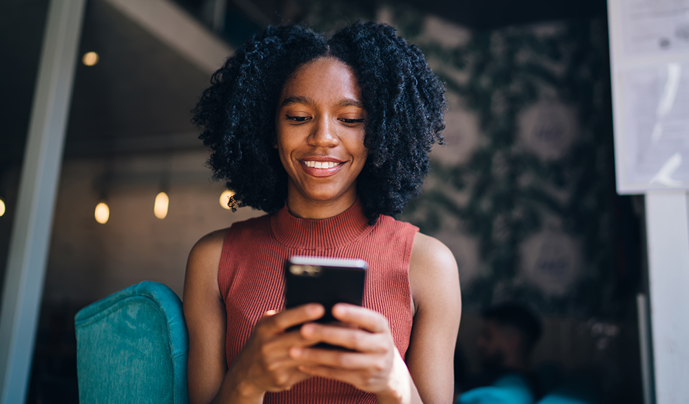 Girl on phone digital banking